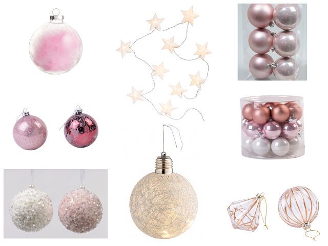 Adornos rosas en la decoración del árbol de Navidad