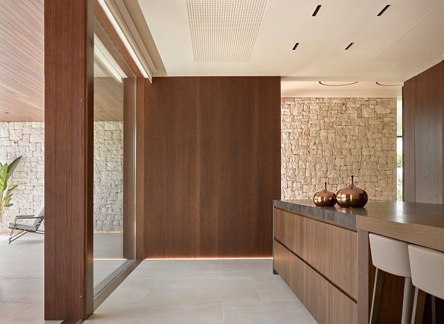 Cocina y cerramiento de Casa Madrigal