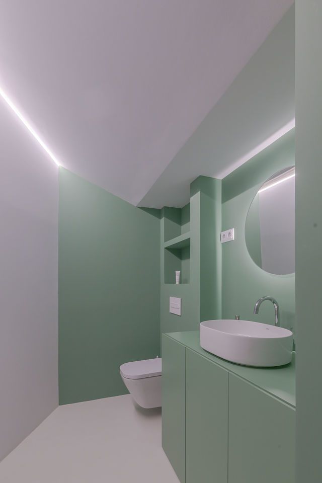 Baño de diseño en color verde
